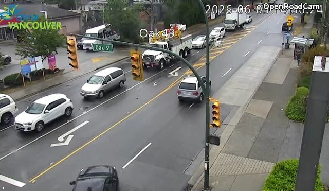 Oak St and W 49th Ave - West
