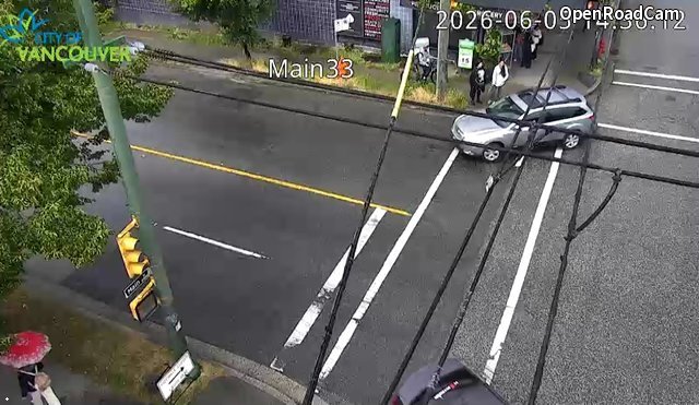 Main St and E 33rd Ave - West
